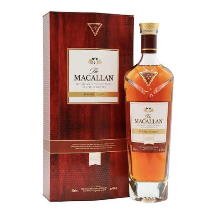 A bottle of The Macallan Rare Cask Speyside Single Malt Scotch Whisky next to its red textured packaging box, on a plain white background.